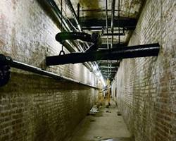 underground service tunnel used in Gilded Age mansions to move workers and supplies invisibly. Hidden Infrastructure in History: 5 Systems of Control