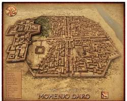 Aerial view of Mohenjo-daro excavation site showing orthogonal street grid, standardized block layout, and elevated citadel mound typical of Indus Valley urban planning circa 2600 BCE