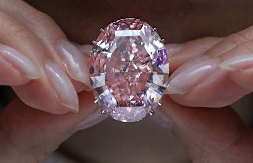 Pink Star 59.60-carat fancy vivid pink diamond ring — oval brilliant cut, internally flawless, $71.2M Sotheby's Hong Kong record