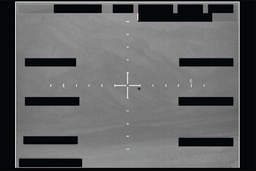 Military FLIR infrared sensor display showing an unidentified aerial object tracked by a U.S. Navy aircraft.