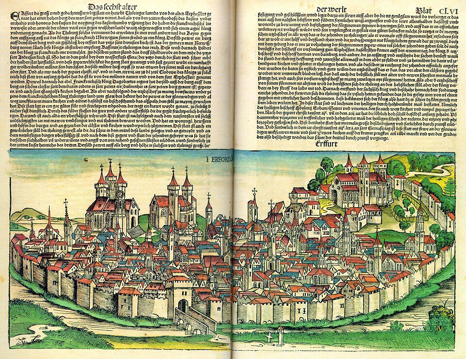 Historic woodcut view of the city of Erfurt from Schedel's Nuremberg Chronicle showing dense urban fabric of churches, guild halls and residential streets before standardized address systems