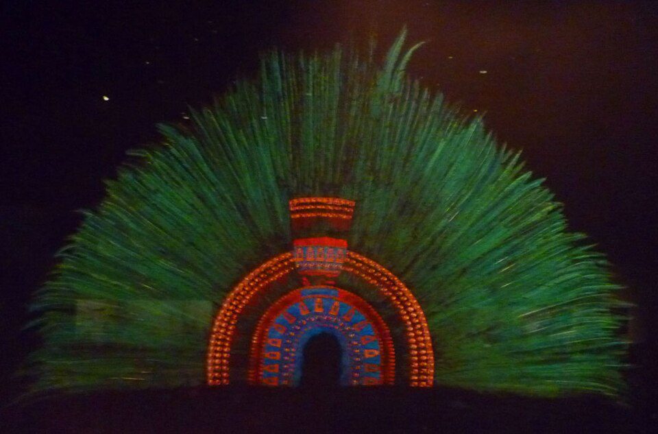 The original iridescent green Aztec feather headdress preserved in a Vienna museum collection