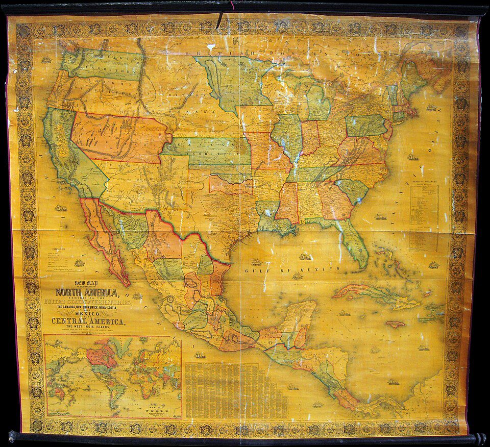 Surveying stakes and a rolled map overlaid on antique land deed documentation representing American land transactions