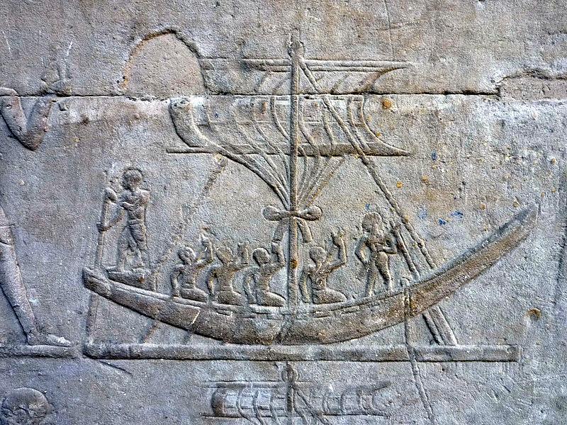 Ancient Egyptian boats transporting goods on the Nile