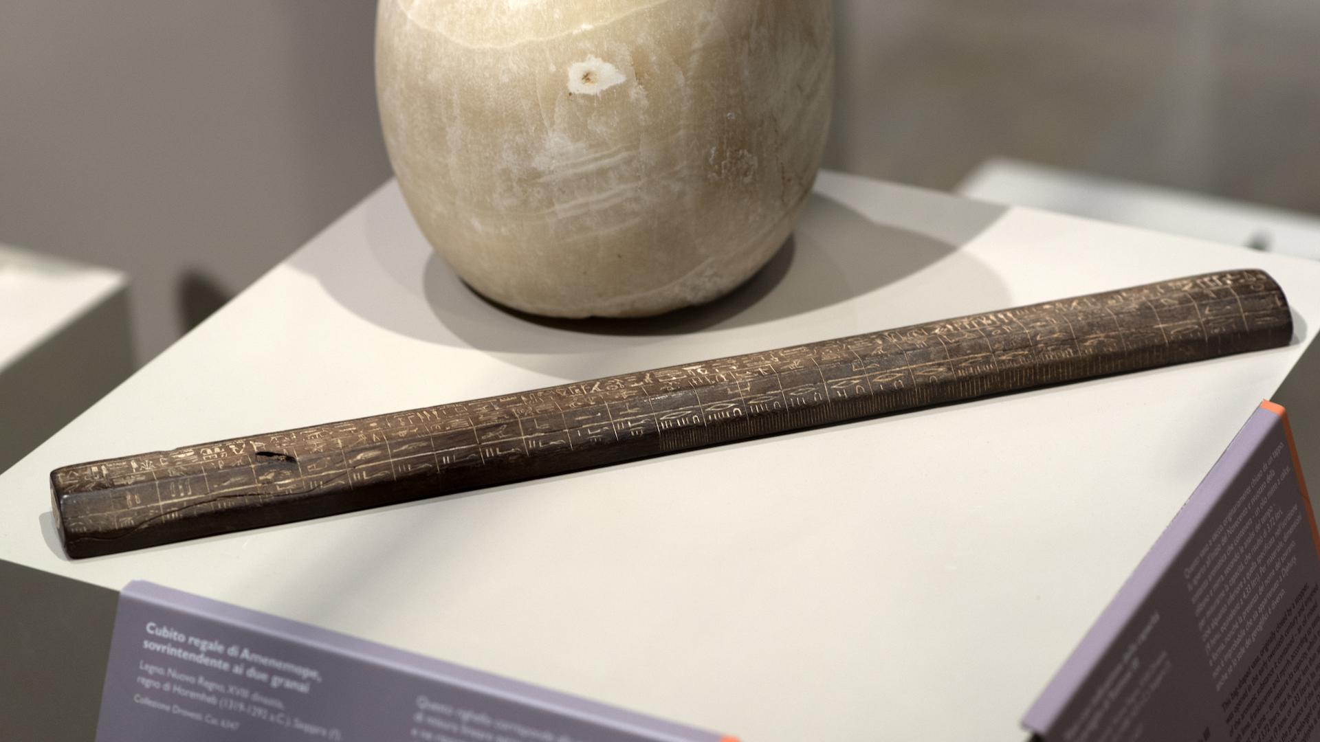 Ancient Egyptian royal cubit rod artifact made of wood with precise technical markings