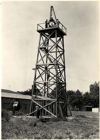 Construction crew erecting a Department of Commerce airway beacon tower near Omaha in the 1920s