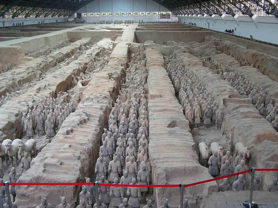 Terracotta Army Xi'an China Terracotta Army clay soldiers lined up in military formation inside massive subterranean pit in Xi'an, China