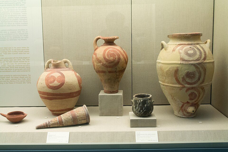 Row of large ceramic storage jars, or pithoi, in a ground-floor storeroom at the Bronze Age site of Akrotiri