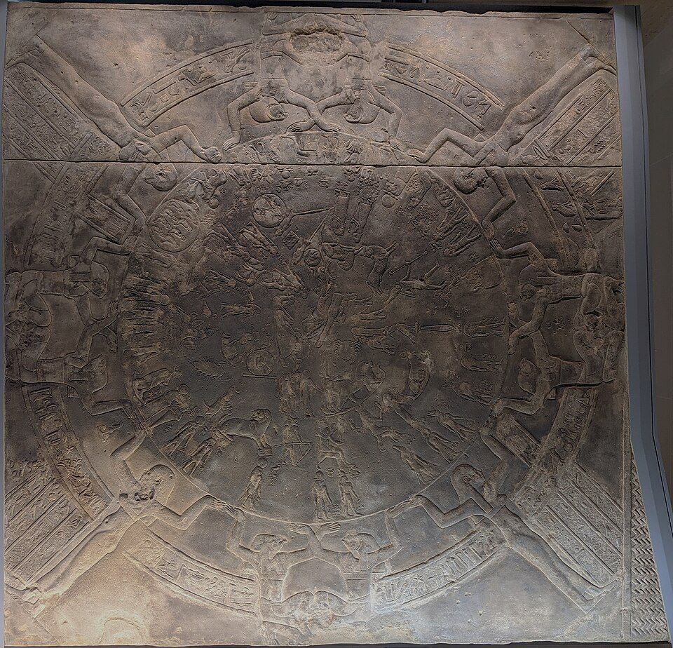 Large circular sandstone relief carved with a detailed map of constellations and zodiac signs