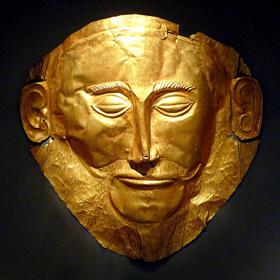 Gold repoussé funerary mask depicting a bearded man's face with closed eyes