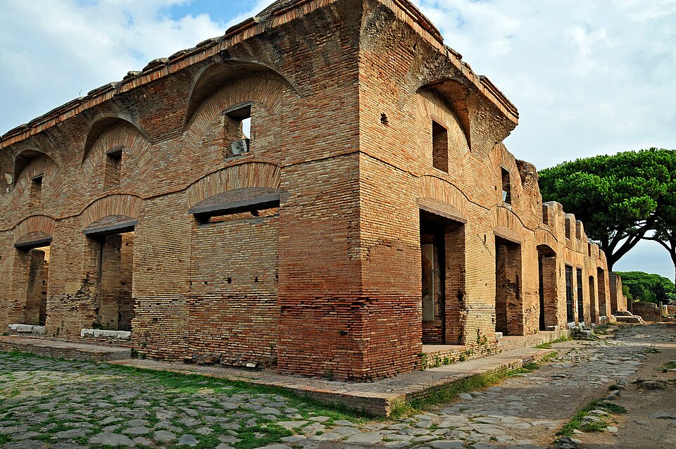 Multi-story brick ruins of the House of Diana in Ostia.
