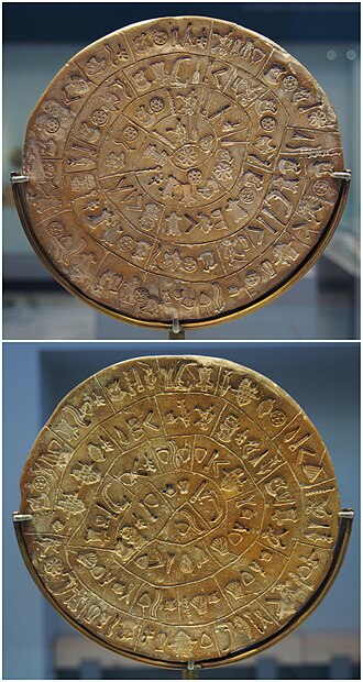 Circular fired clay disc stamped with a spiral of unique hieroglyphic symbols